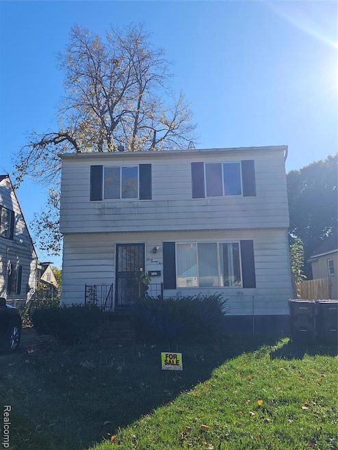 Colonial house with a front lawn