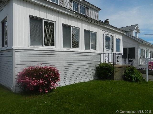 FRONT OF HOME FACING THE BEACH