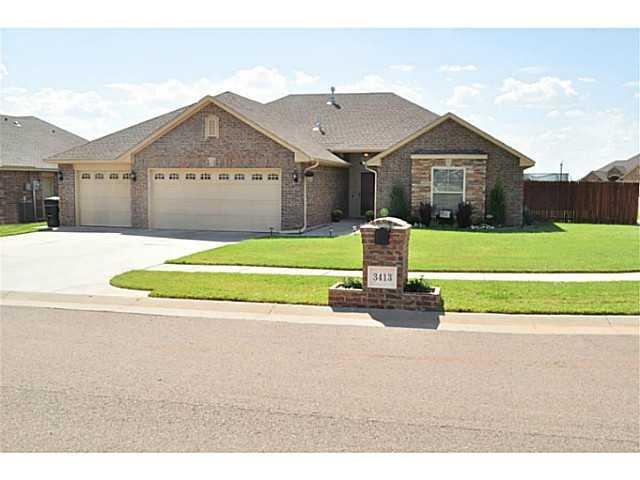 Exterior Front. Breathtaking custom home with upgr