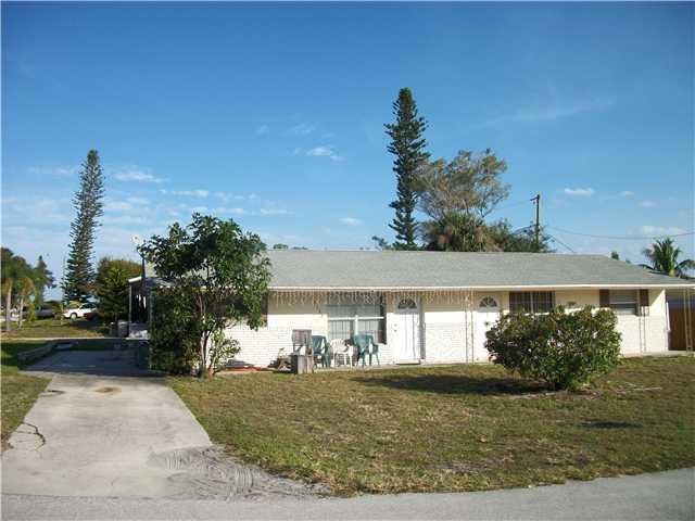 Exterior Front. 2120 Side Driveway Carport