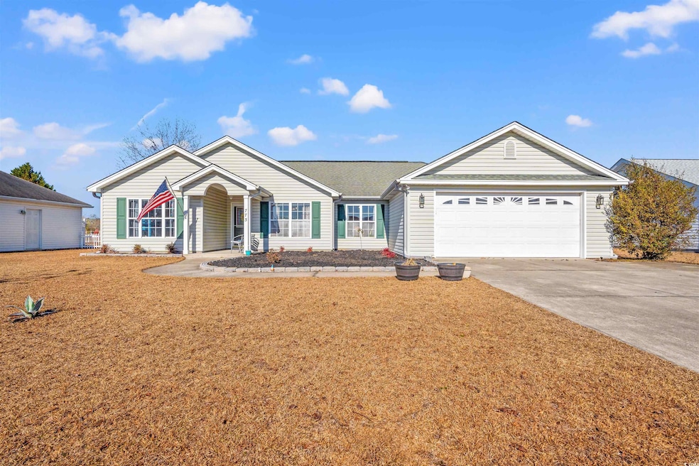 Single story home with a garage