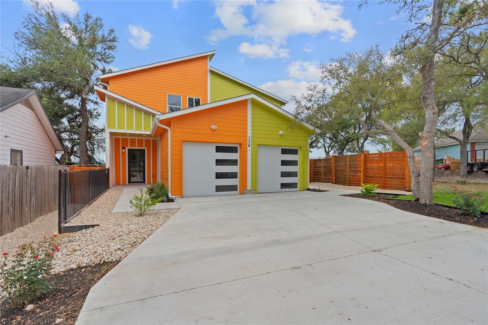View of front of property featuring driveway and 