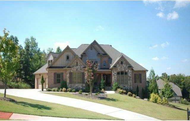 Exterior Front. Four side brick beauty with stone,
