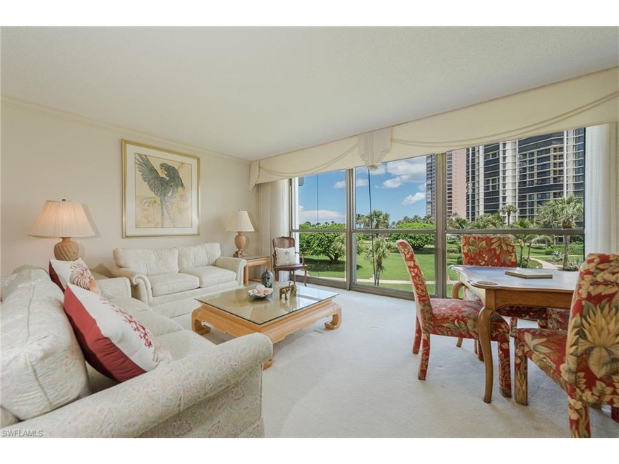 Living room with floor to ceiling windows