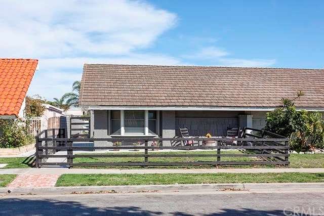 Front of the home with gated entry.