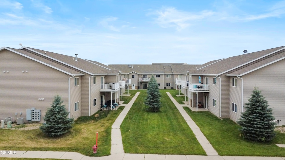 4000 Mckenzie Dr SE unit 9, Mandan, ND 58554 - photo 1