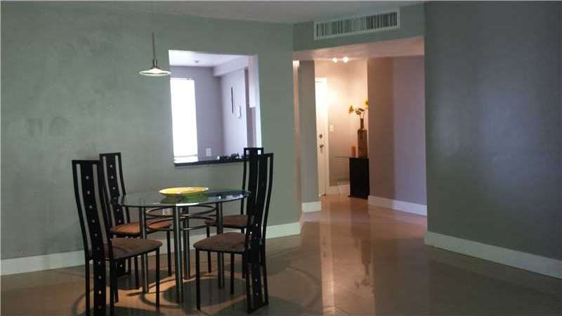 1701 NE 191st St unit A301, Miami, FL 33179 - photo 1
