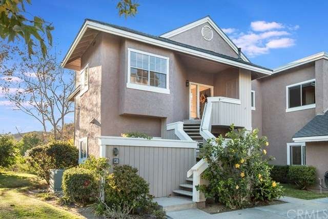 Lovely upper level end unit with a beautiful view 