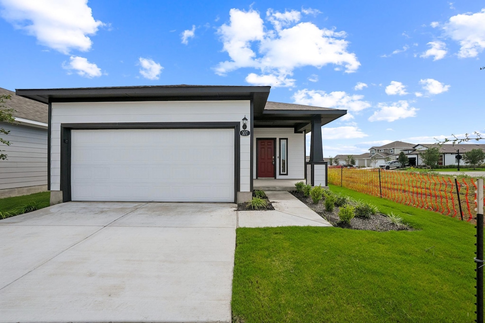 View of front of home with concrete driveway and 