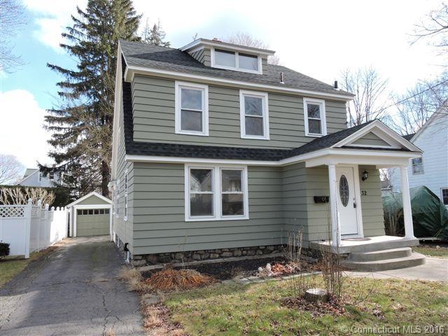Westside Colonial nestled on level lot offers ther