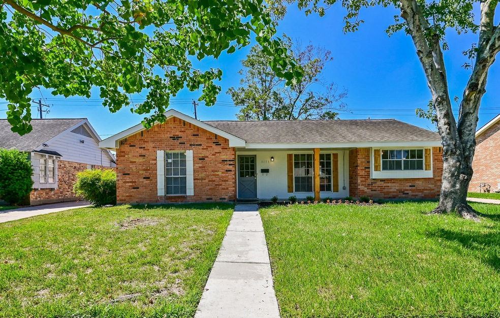This solid brick/wood single family, single story