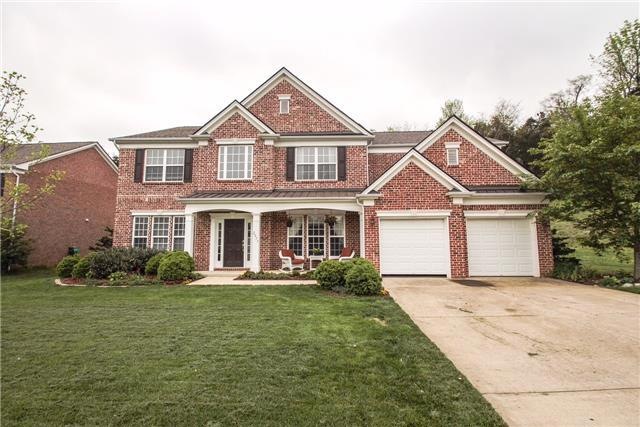 All brick with super private lot. Level with easy no-stairs access. Guest room & bath on main level. 