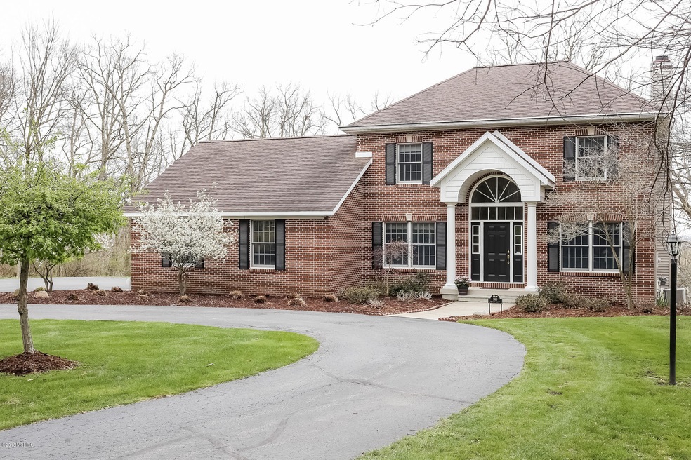 140 Pearson Ct, Lowell, MI 49331 - photo 1