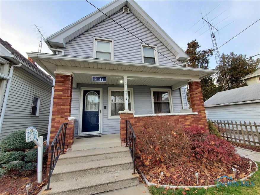 Solid front porch. Great Landscaping in the spring