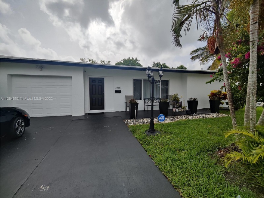 7418 NW 73rd Ave, Tamarac, FL 33321 - photo 1