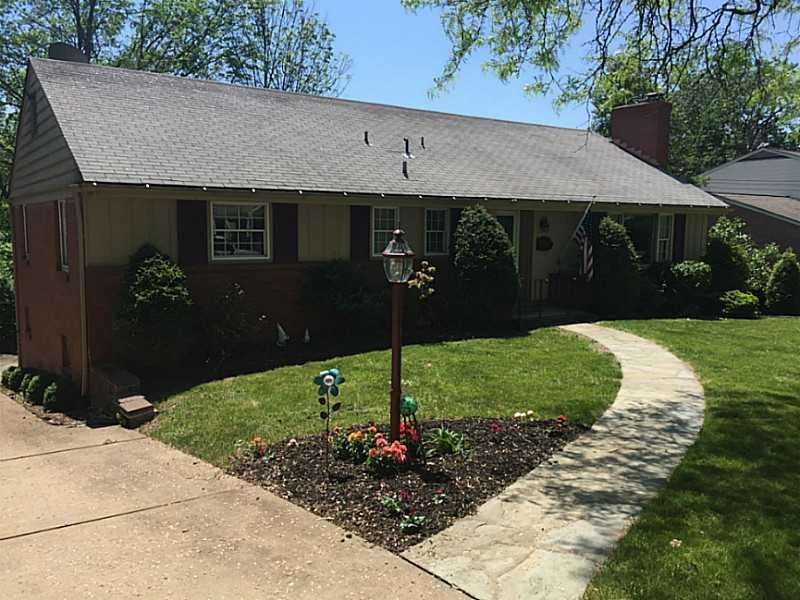 Exterior Front. Level entry ranch. Total curb appe