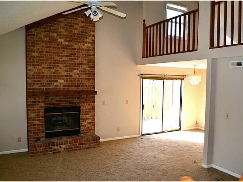 Great Room. two story great room with cozy fireplace open to the kitchen and dining room!