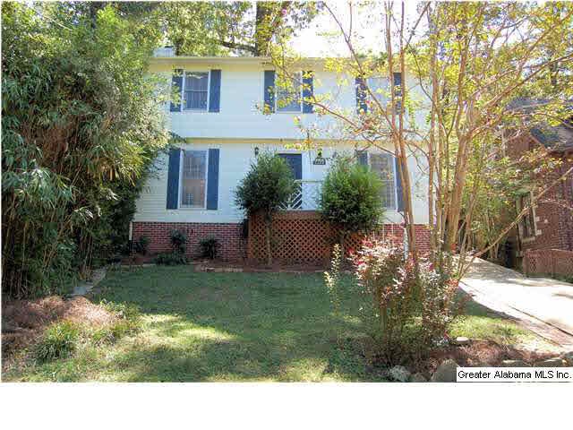 WOW! This two-story beauty is located on Diaper Ro