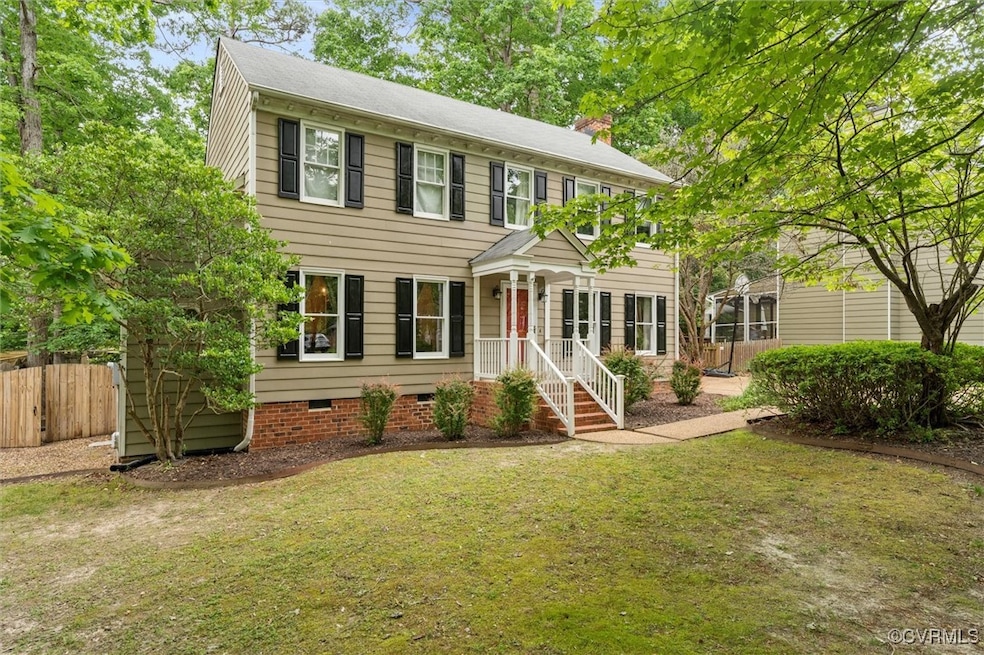 Colonial-style house with a chimney and crawl spac