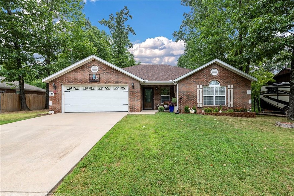 3 Sided Brick Home, level driveway and new landscaping. Welcome Home !!