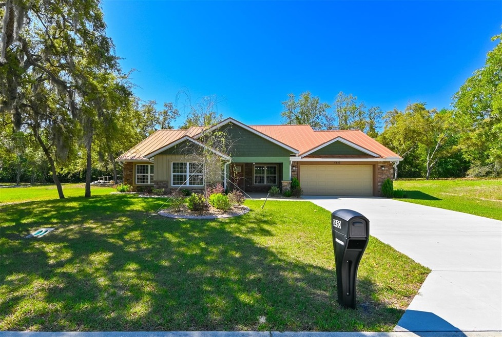 NEW CONSTRUCTION CUSTOM HOME. Welcome! Copper coloured metal roof. 2 car garage. Large driveway. Landscaping.