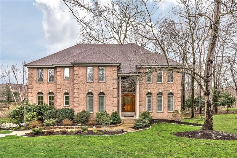 Stately brick colonial in desirable Greenbriar Est