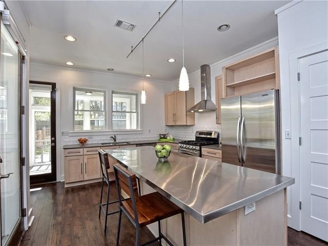 Sleek Stainless Steel Kitchen Island also can serv