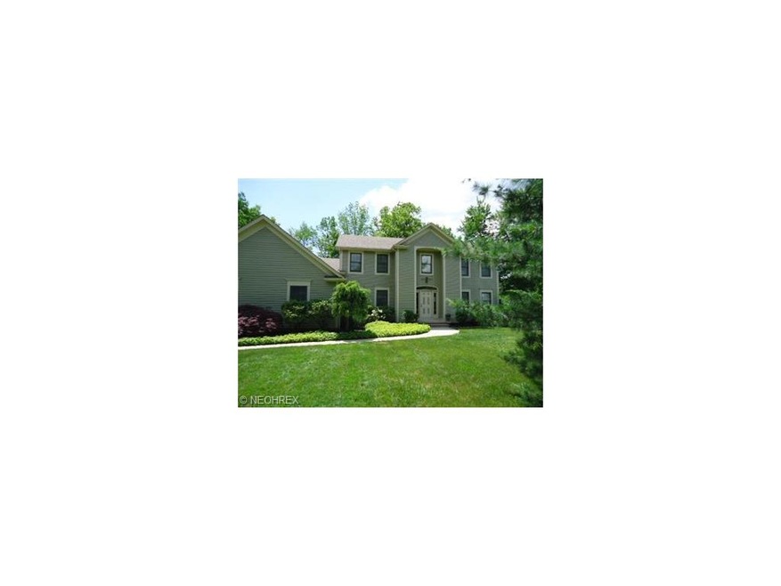 Welcome home to 8640 Four Seasons Trail in Poland,