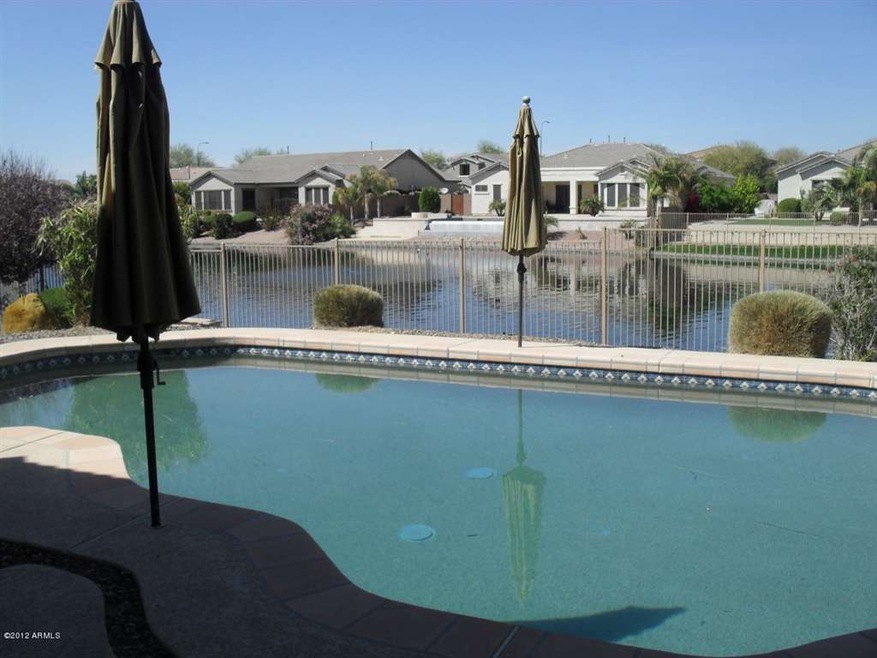 Water Front view of Lake and Pool