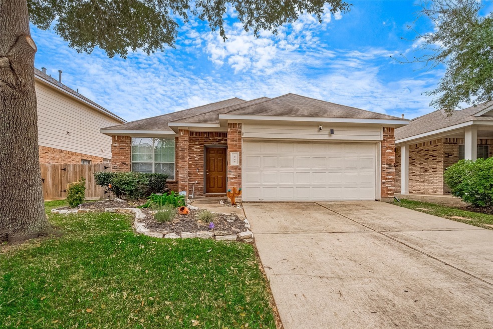 Charming single-story brick home with a spacious t