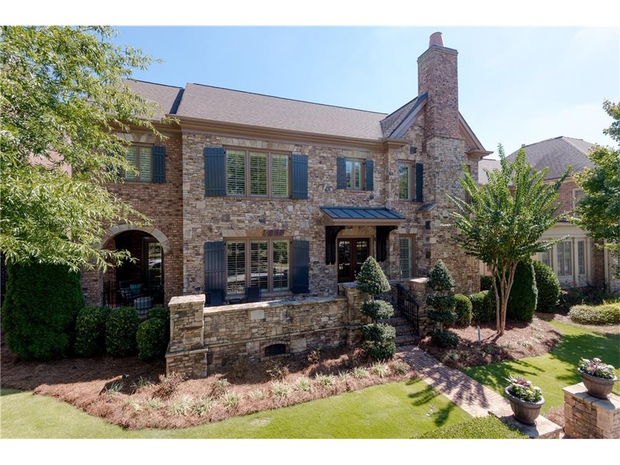 STUNNING BRICK CARRIAGE STYLE HOME WITH SIX BEDROO