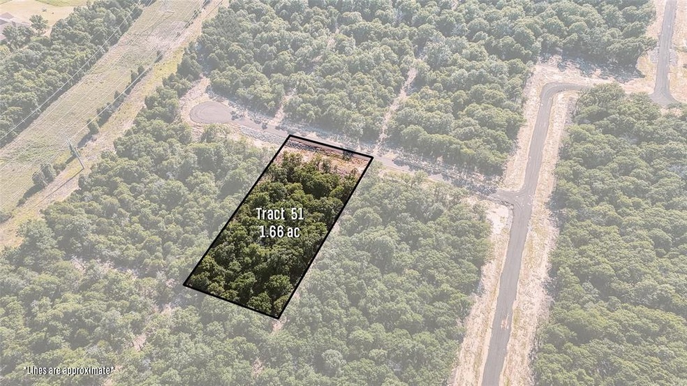 Aerial view of property and surrounding area featuring property boundaries highlighted