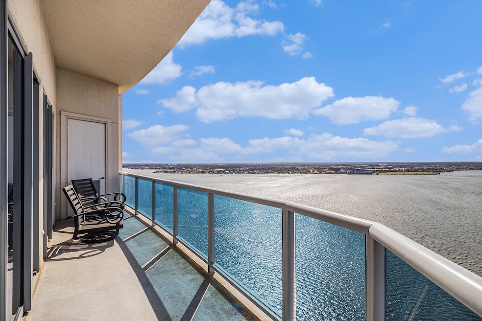 ENJOY LAKE VIEWS FROM LARGE BALCONY OFF LIVING ARE