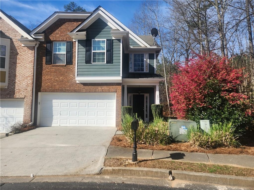 View of front of property with a garage