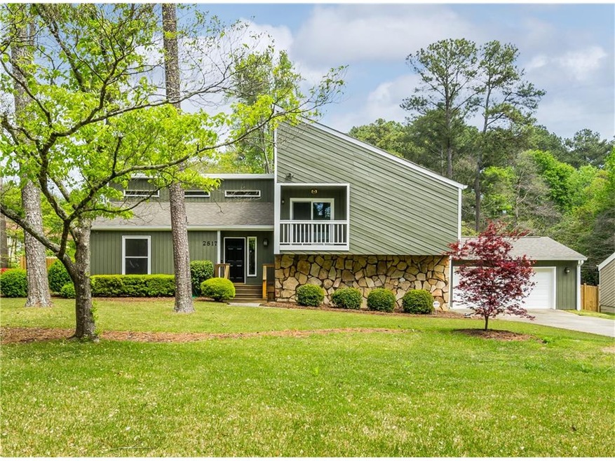 Mature landscaping, level driveway and fresh paint