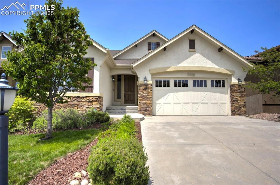 Beautifully landscaped front yard with recently painted exterior.