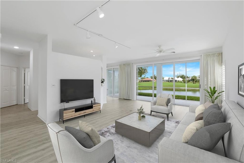 1651 Bermuda Greens Blvd unit 10, Naples, FL 34110 - photo 1