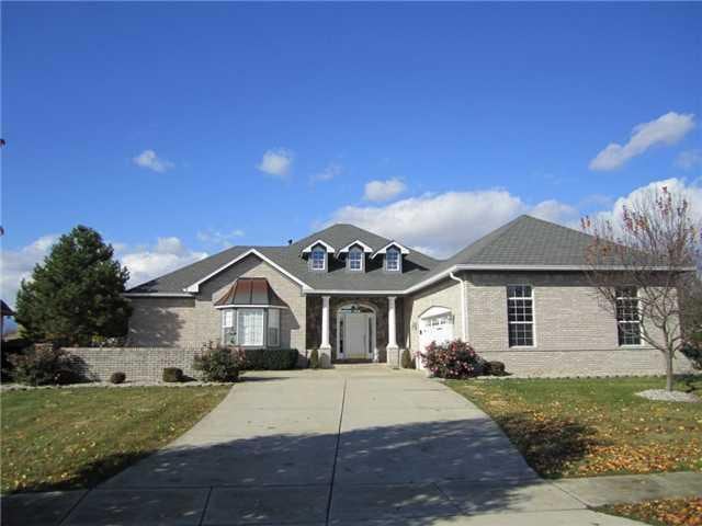 Exterior Front. Custom built all brick and stone ranch in Noblesville.