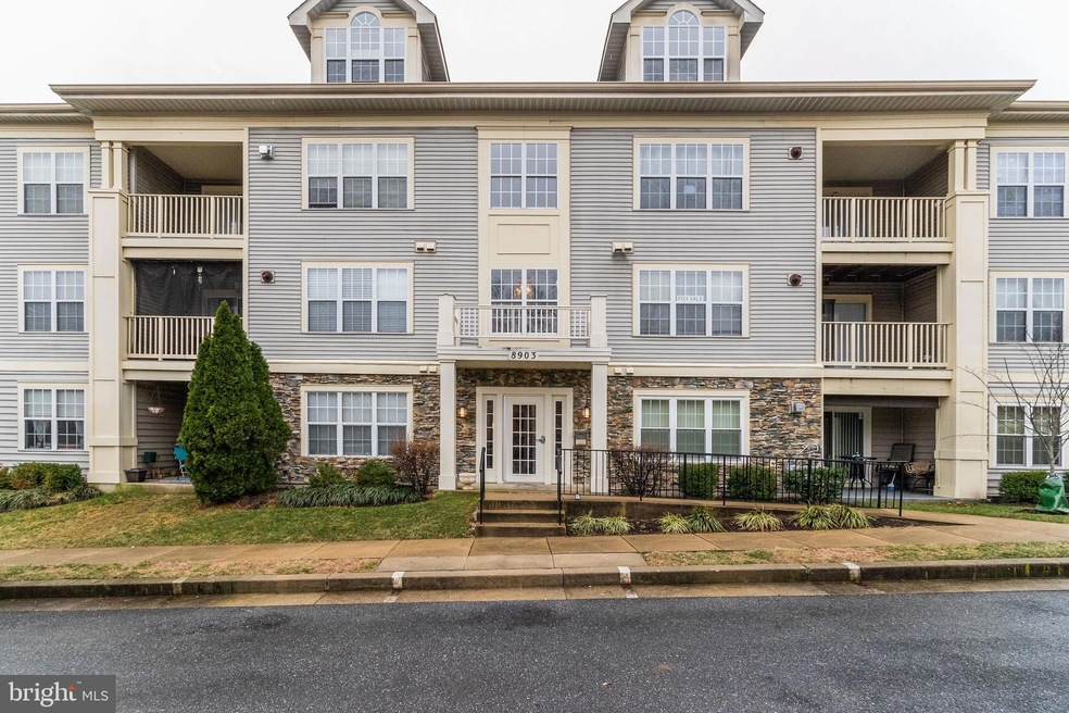 8903 Stone Creek Place unit 303, Pikesville, MD 21208 - photo 1