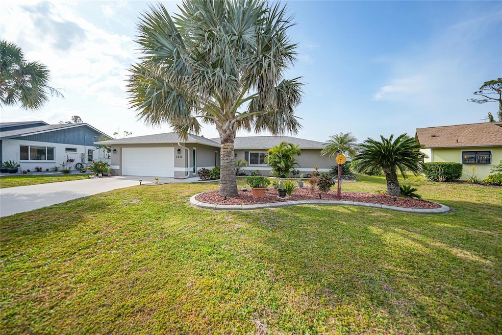 1311 Pine Needle Rd, Venice, FL 34285 - photo 1