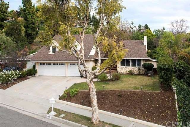 Front of house, 3 car garage