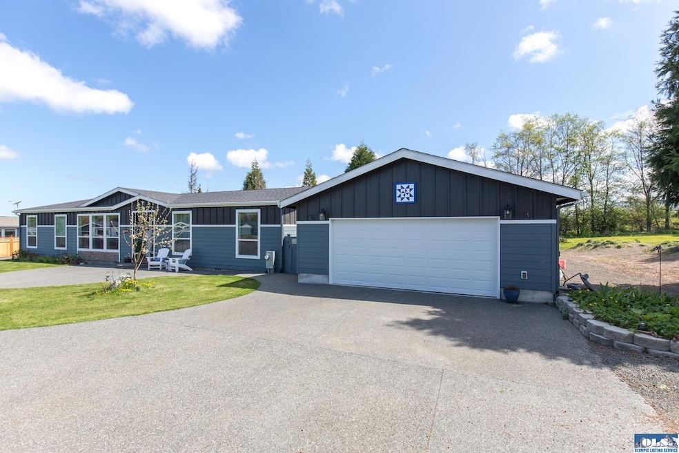 2100 square feet + an oversized garage on just over half an acre!