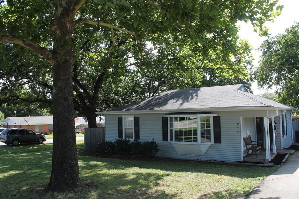 Magnificent trees on large corner lot
