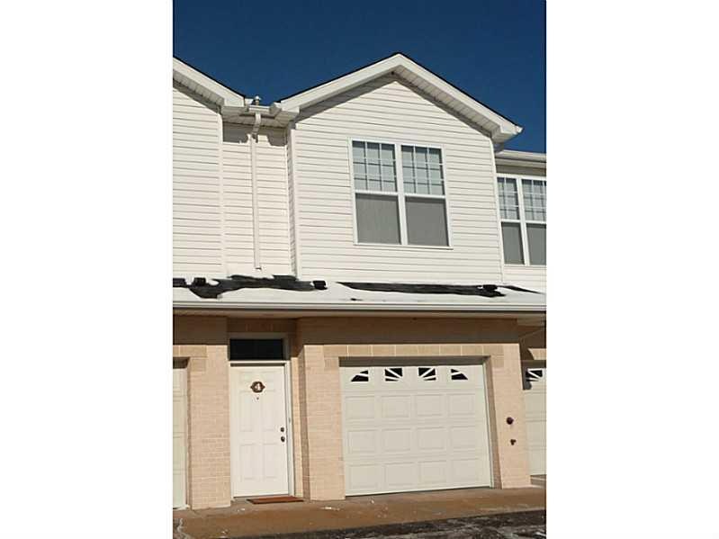 Exterior Front. Unit #4 is framed in this photo of
