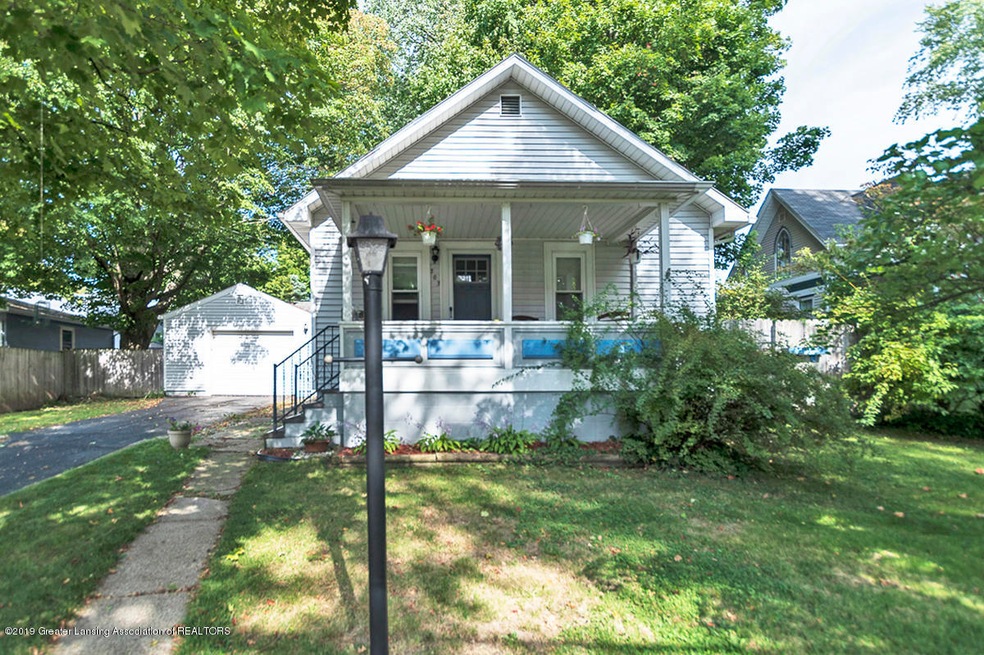 303 E Front St, Grand Ledge, MI 48837 - photo 1