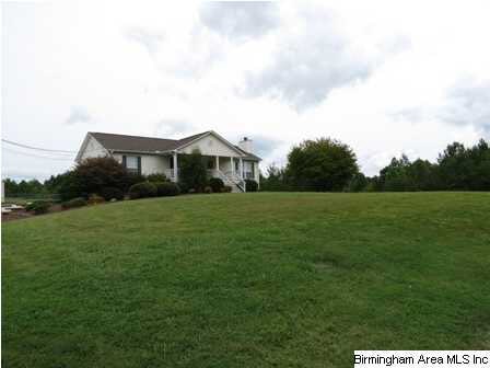 Well maintained home situated on 3 private acres. 
