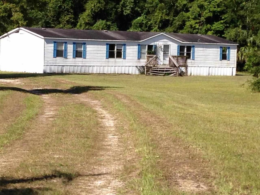 91 Dixie Dr, Crawfordville, FL 32327 - photo 1