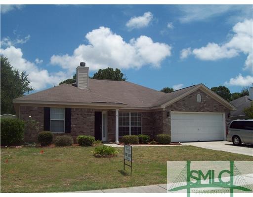 Exterior Front. Brick and Vinly Exterior with Doub
