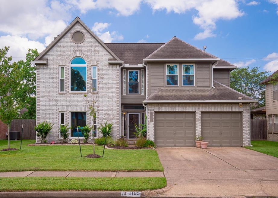 Welcome to 1105 Woodchase Drive!  This two story brick and wood elevation home with a double wide driveway boasts fresh exterior paint and seamless double pane windows, and is situated just a few houses from the neighborhood pool and park.