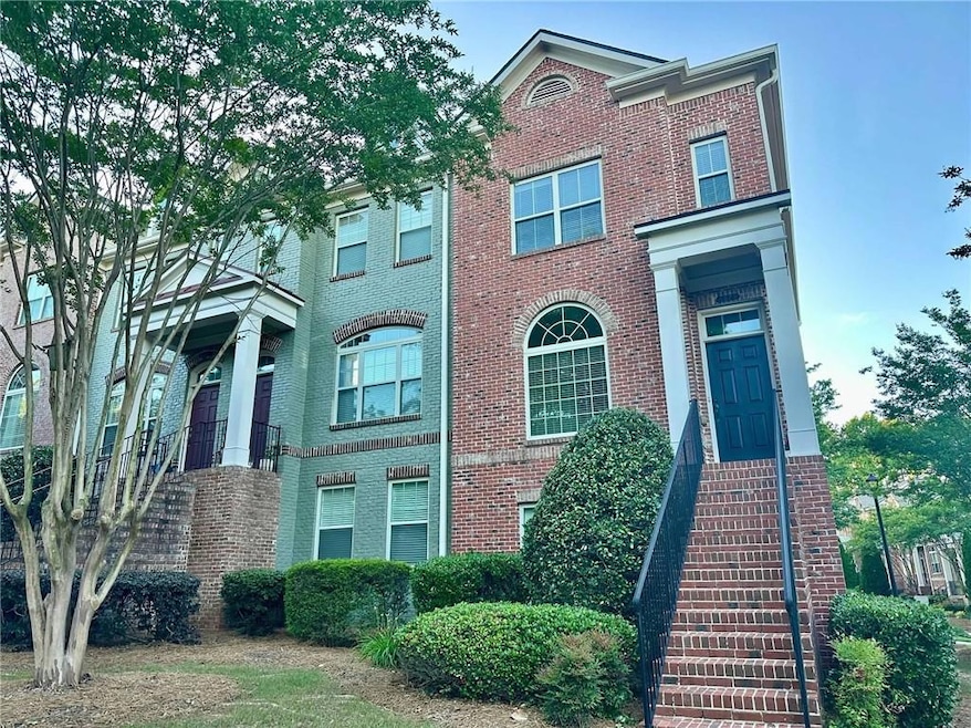 View of front of property featuring brick siding